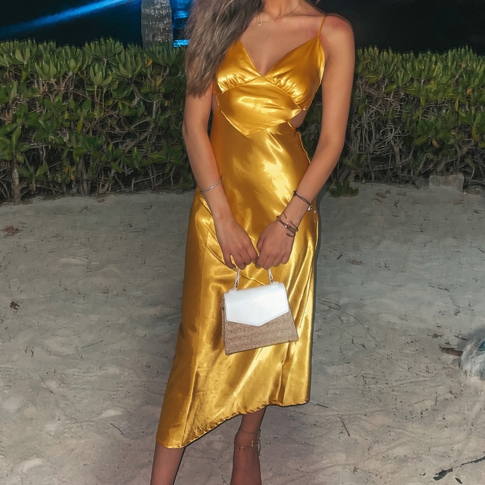 Gold/Yellow satin midi dress with side cut outs.